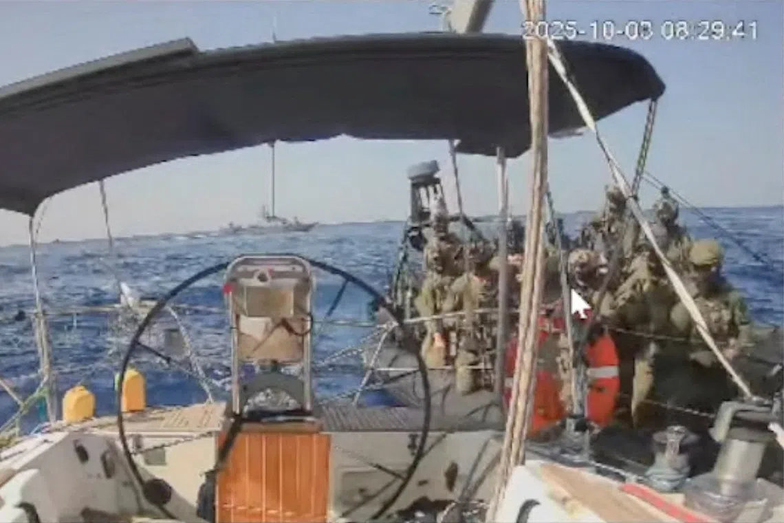 A screengrab from a live stream video shows Israeli navy forces approaching the vessel the Marinette, believed to be the only ship from the Global Sumud Flotilla still sailing towards Gaza, which flotilla organisers report has now been intercepted, October 3, 2025. Global Sumud Flotilla/Handout via REUTERS