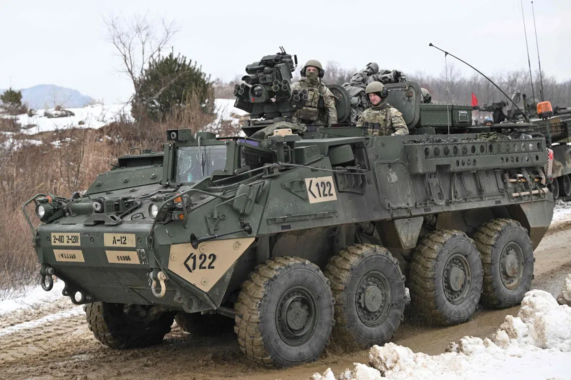 US soldiers on a Stryker armoured vehicle participate in a joint live fire exercise with South Korea at a military training field in Pocheon on Jan 4.