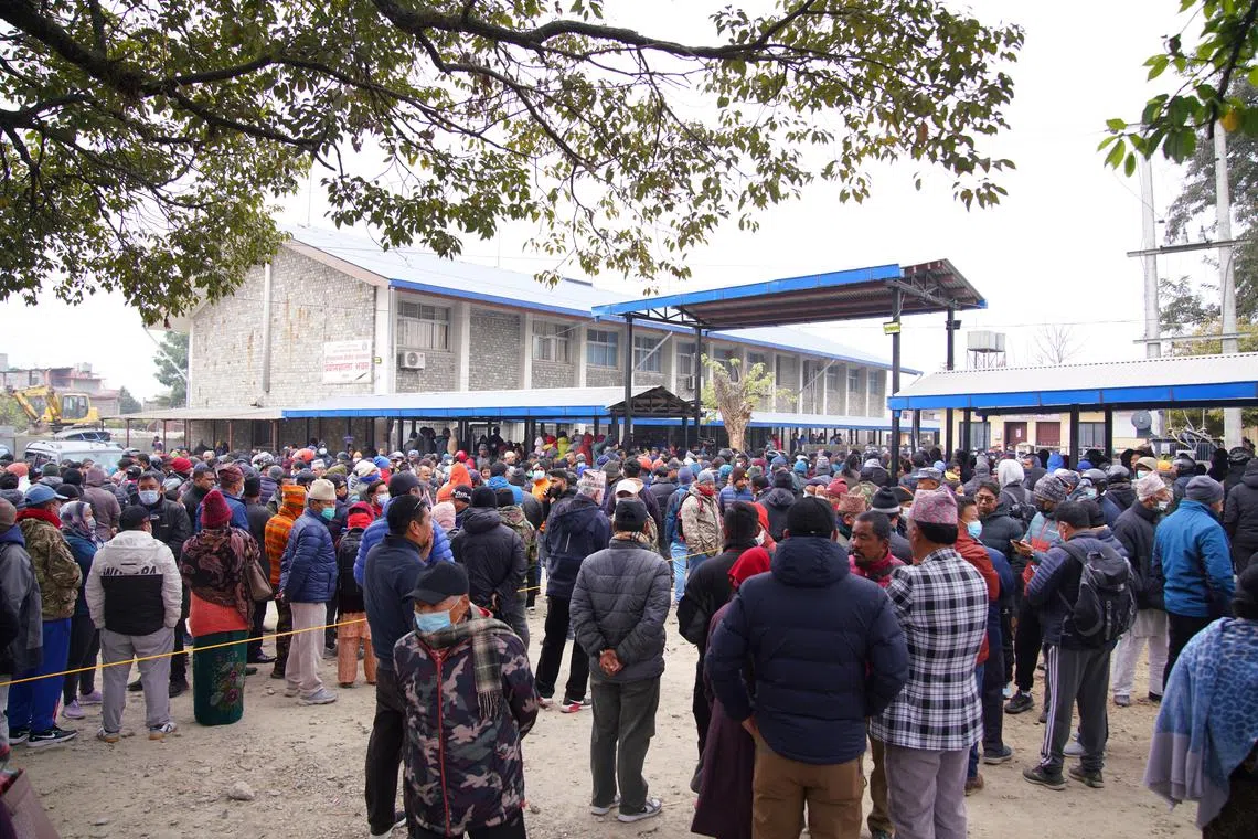 Family members of the Yeti Airlines ATR72 aircraft victims wait outside the hospital mortuary in Pokhara, Nepal, Jan 16, 2023.