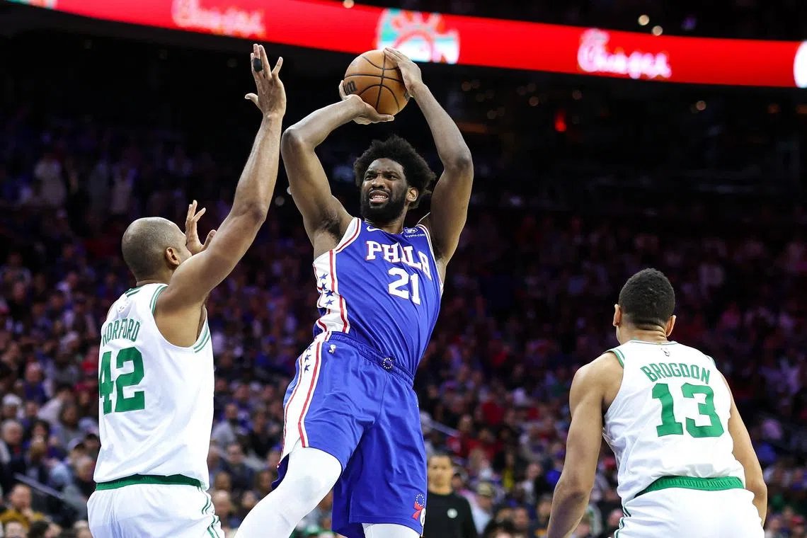 Joel Embiid of the Philadelphia 76ers shooting over Boston Celtics' Al Horford during the second quarter at Wells Fargo Centre on Tuesday. The 76ers go on to win 103-101 at the Wells Fargo Centre.  