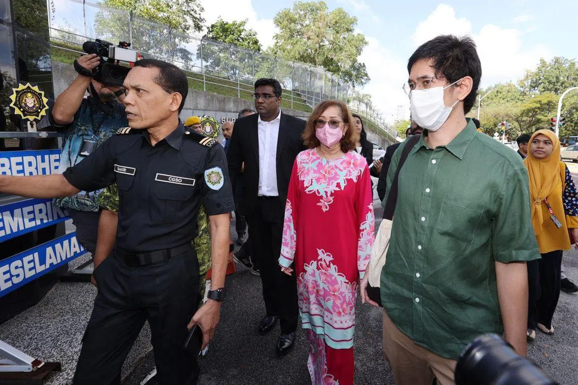 Toh Puan Naimah Khalid and both her sons entering the MACC's headquarters in Putrajaya on Jan 10, 2024.