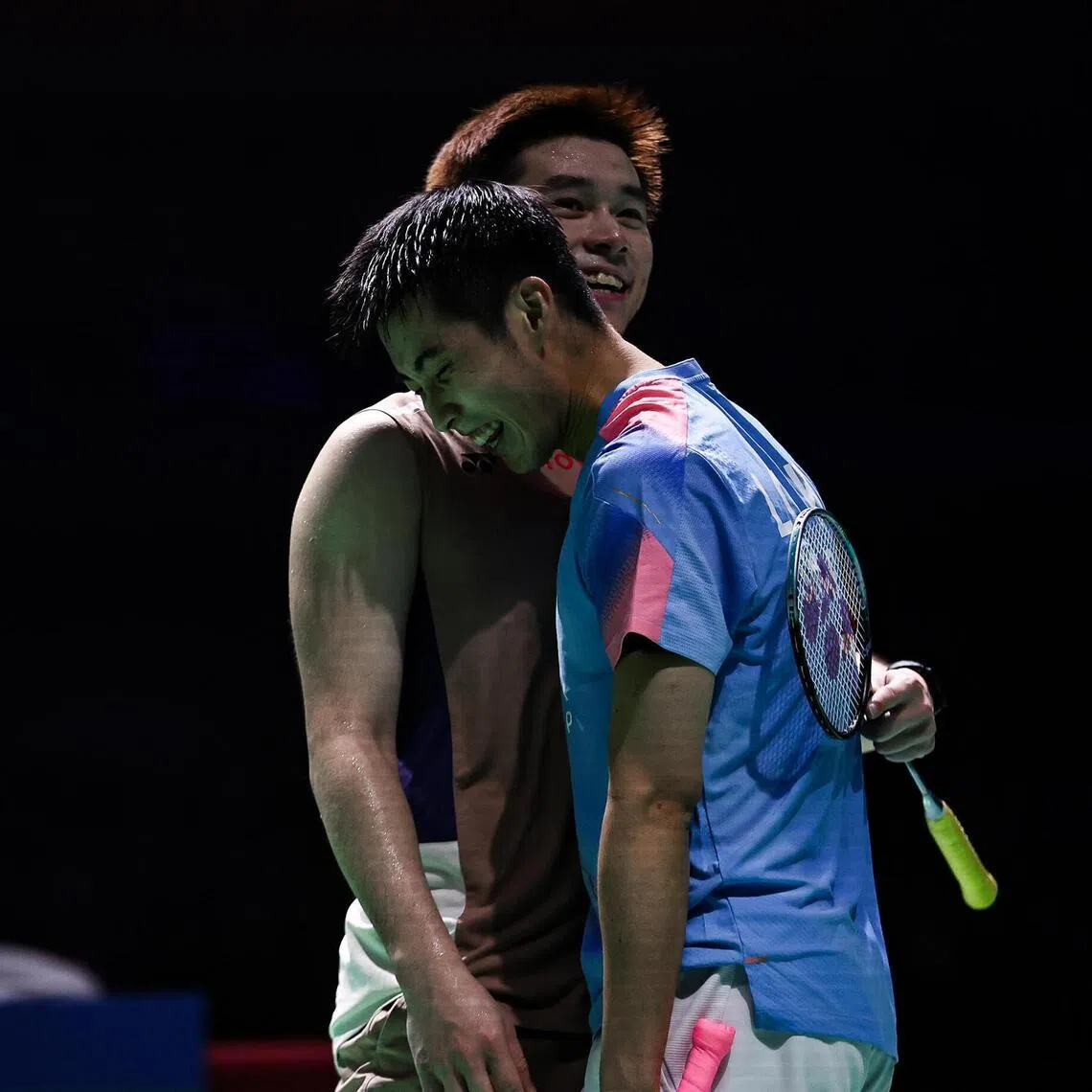Loh Kean Yew (right) with Kunlavut Vitidsarn after beating the Thai at the India Open men's singles quarter-finals in New Delhi on Jan 16.