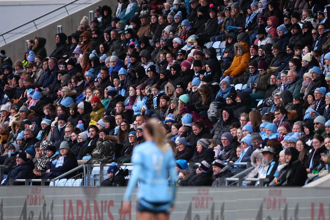 FILE PHOTO: Soccer Football - Women's Super League - Manchester City v Leicester City - Manchester City Academy Stadium, Manchester, Britain - December 8, 2024 Manchester City fans in the stands Action Images via Reuters/Craig Brough/File Photo