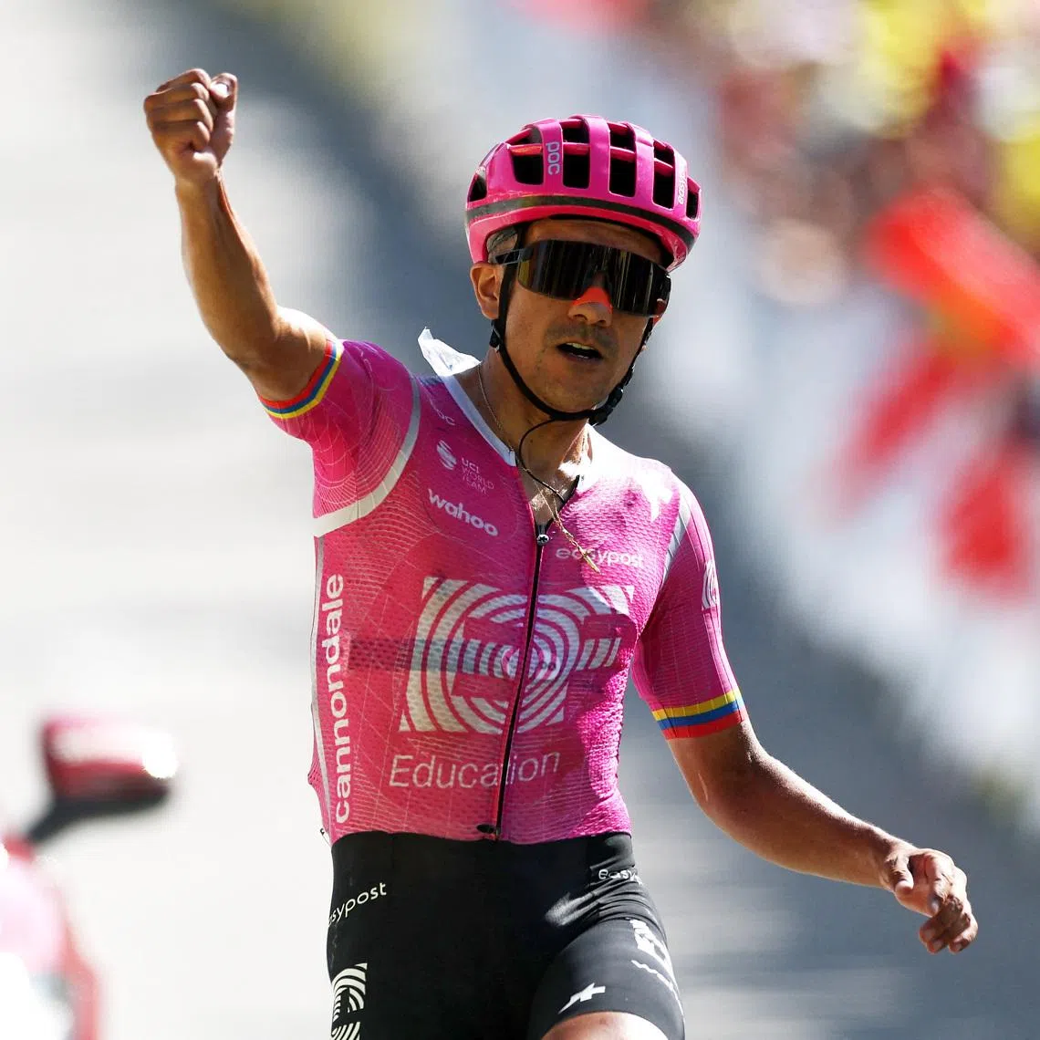 EF Education-EasyPost’s Richard Carapaz celebrates as he crosses the finish line to win Stage 18.