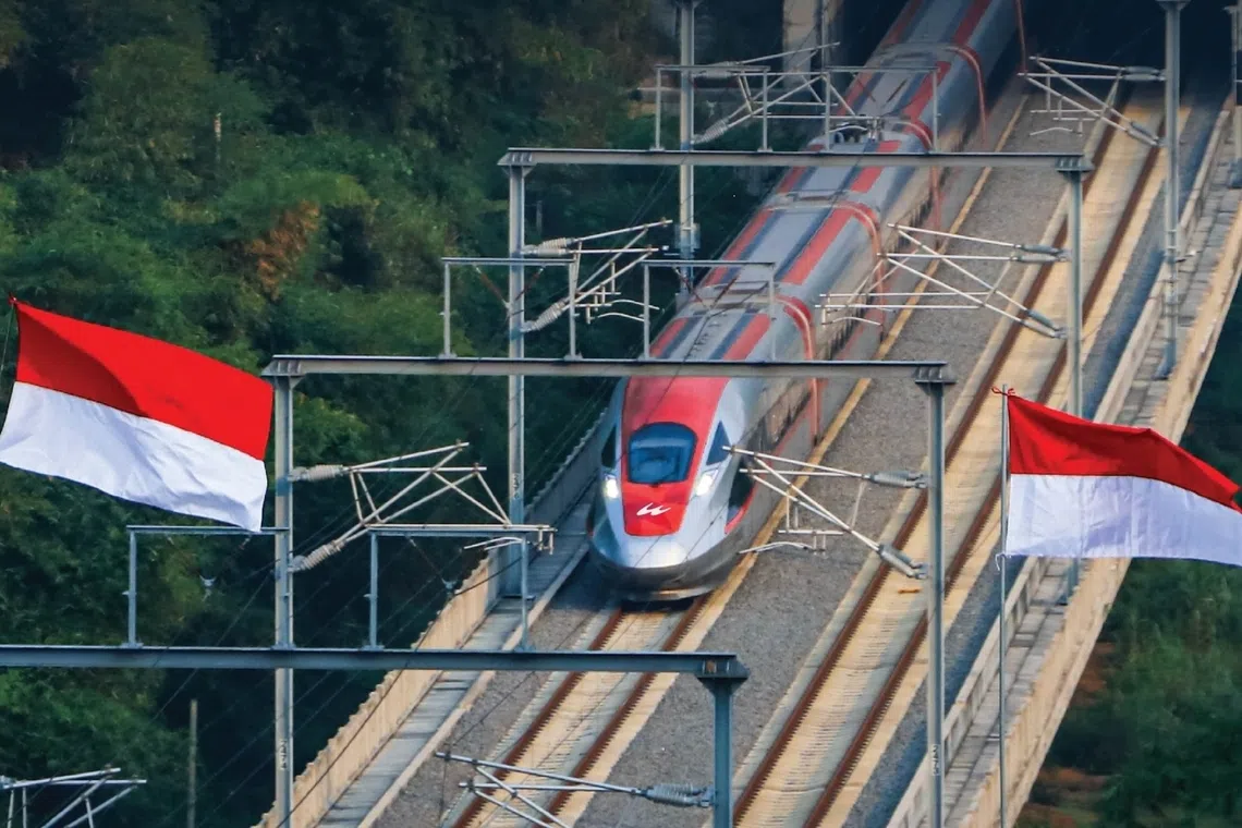 Whoosh high-speed rail project connects Jakarta and Bandung, with plans for extension to Banyuwangi.