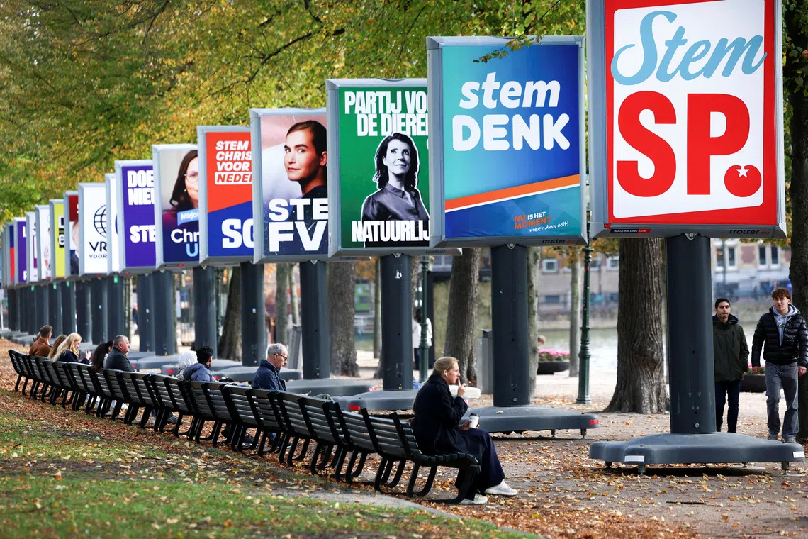 FILE PHOTO: Election campaign boards are displayed ahead of the Dutch parliamentary election on October 29, in The Hague, Netherlands, October 7, 2025. REUTERS/Piroschka van de Wouw/File Photo
