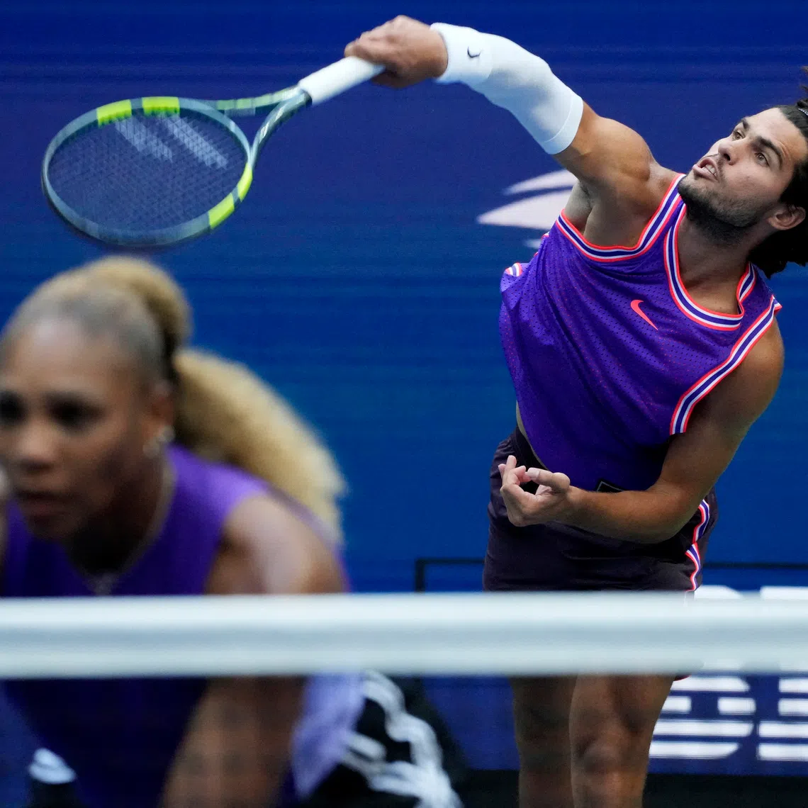 Carlos Alcaraz (right) during his US Open mixed-doubles quarter-final match with Serena Williams.