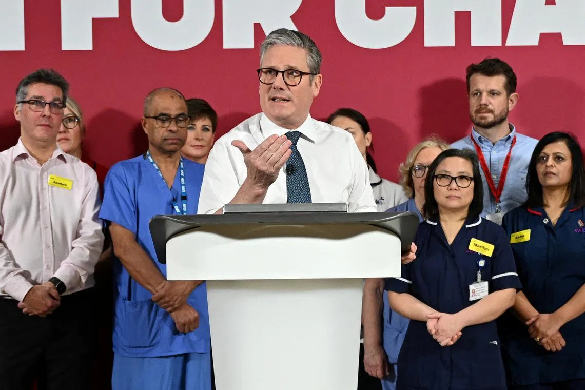 Britain's Prime Minister Keir Starmer gives a speech on reducing NHS wait times as he visits a healthcare provider in Surrey, on January 6, 2025 in Epsom, Britain.  Leon Neal/Pool via REUTERS