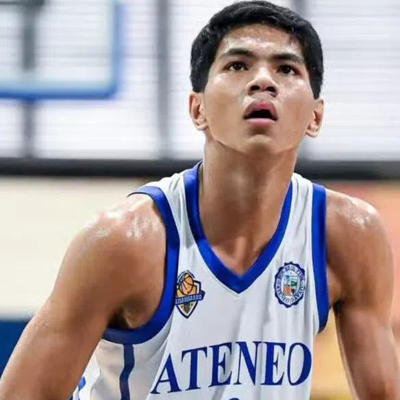 Rene Clert Baterbonia (left) and Divine Adili were playing for Ateneo de Manila’s top-ranked basketball team.
