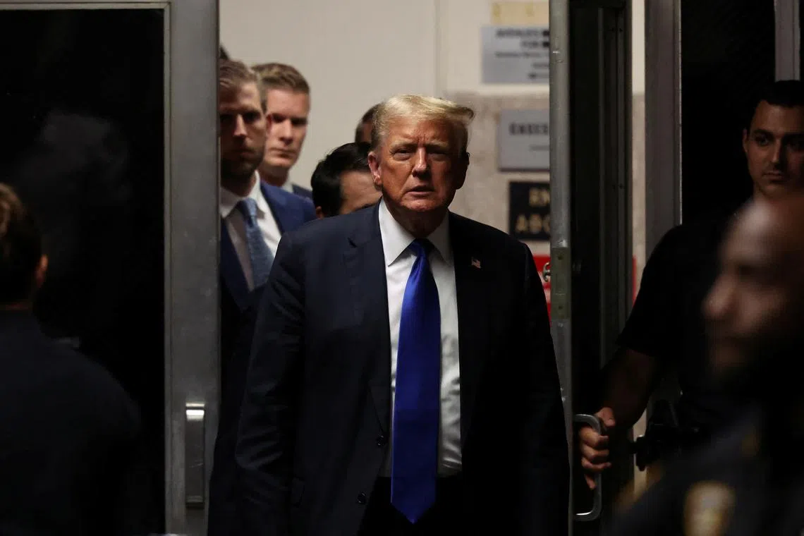 Former U.S. President Donald Trump returns to the courtroom during his hush money trial at Manhattan Criminal Court on May 30, 2024 in New York City. Michael M. Santiago/Pool via REUTERS