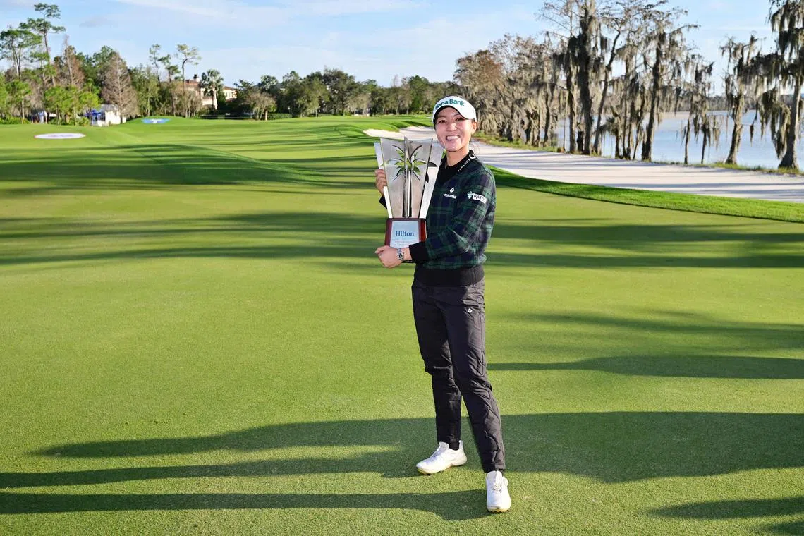 New Zealand’s Lydia Ko with the trophy after winning Tournament of Champions title at Lake Nona Golf & Country Club, in Florida, on Jan 21.