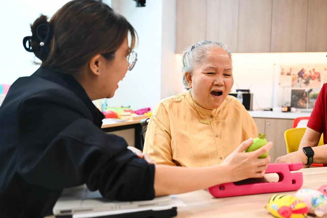 Madam Suphattra Taengyotha (right) with speech therapist Iris Lee, at S3@Jurong Point in December 2025.