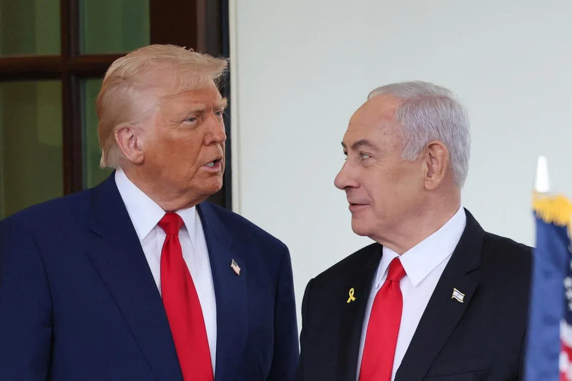 FILE PHOTO: U.S. President Donald Trump welcomes Israeli Prime Minister Benjamin Netanyahu at the entrance of the White House in Washington, D.C., U.S., April 7, 2025. REUTERS/Leah Millis/File Photo