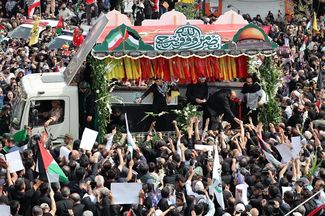 A truck carrying the coffins of Hamas leader Ismail Haniyeh and his bodyguard during a funeral procession in Tehran on Aug 1.