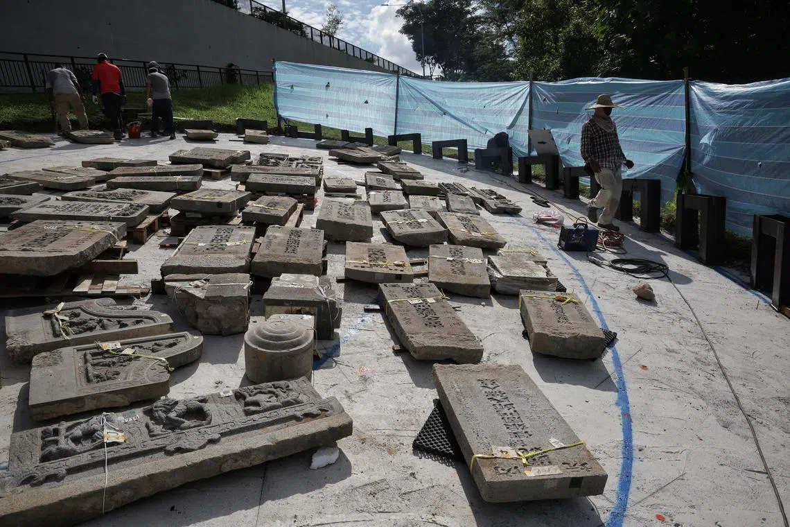 Work taking place for an outdoor installation, designed from artefacts recovered from the exhumation of around 4,000 graves, which began in December 2013 to make way for Lornie Highway, at Bukit Brown on June 28, 2024. The project “Voices of Bukit Brown” marks a significant milestone in raising awareness of Bukit Brown’s heritage. Around 80 unclaimed above-ground artefacts have been identified to be included in the outdoor installation, with inputs from researchers and volunteers from Singapore Heritage Society (SHS) and all things Bukit Brown (atBB).