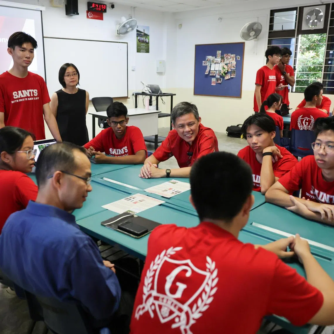 Minister for Education Mr Chan Chun Sing interacts with St Andrew's Junior College's JC1 students during the Character and Citizenship Education lesson on Racial Harmony Day, on July  19, 2024.