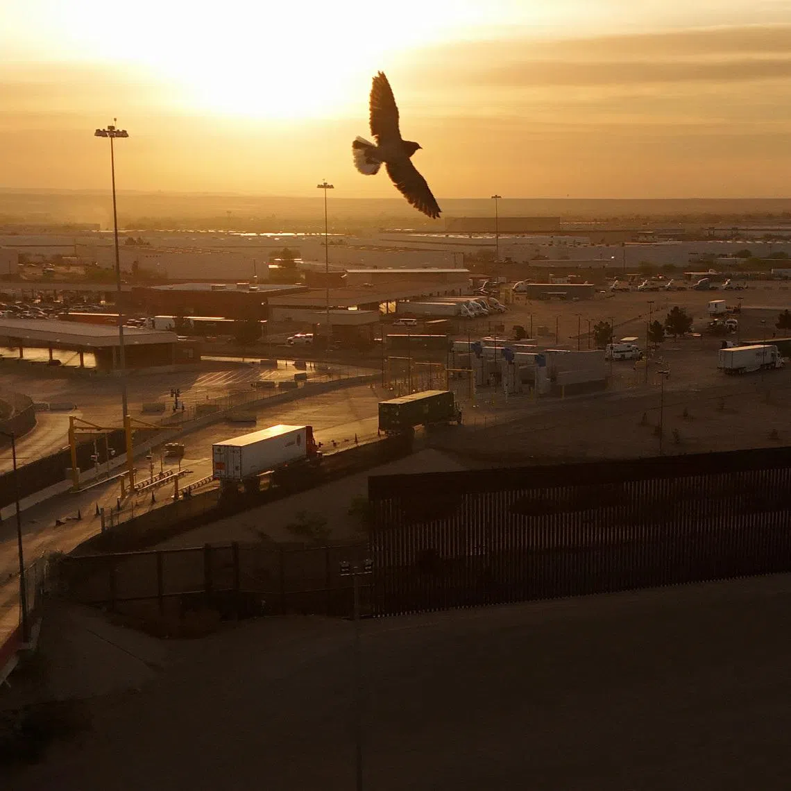 A drone view shows trucks crossing into the United States via the Zaragoza-Ysleta border bridge, in Ciudad Juarez, Mexico, April 2, 2025. REUTERS/Jose Luis Gonzalez