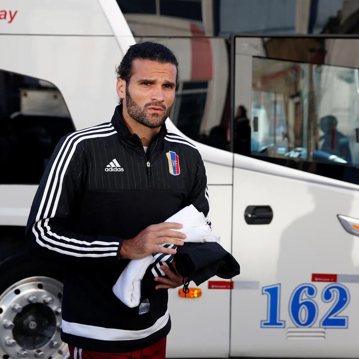 Football Soccer - Venezuela training - World Cup Qualifiers - Montevideo, Uruguay 4/10/16. Venezuela's Oswaldo Vizcarrondo arrives for a team training. REUTERS/Andres Stapff