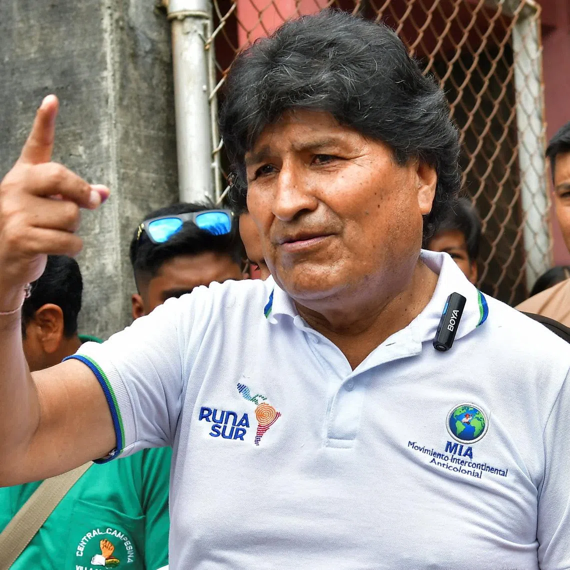 Former Bolivian President Evo Morales gestures as he leaves after casting his ballot, at a polling station during the presidential runoff election, in Cochabamba, Bolivia October 19, 2025. REUTERS/Patricia Pinto