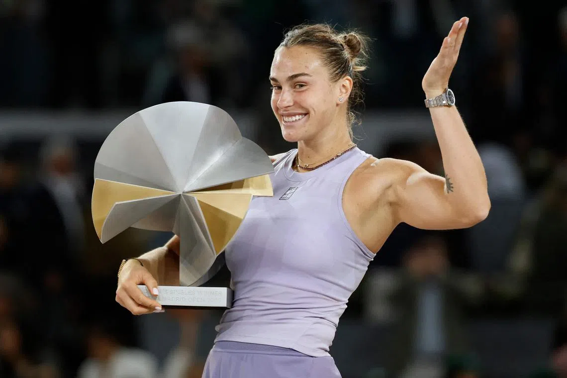 World number one Aryna Sabalenka posing with her trophy after defeating Coco Gauff to win her third Madrid Open title.