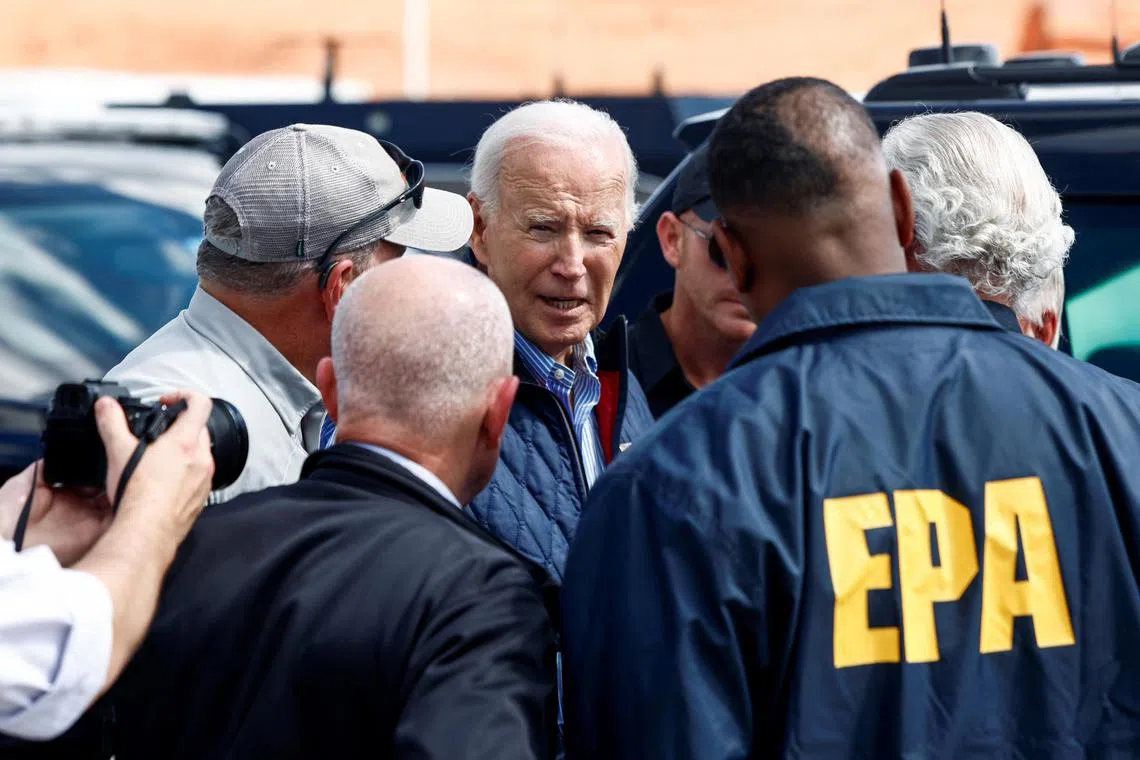 US President Joe Biden (centre) arriving in Greer, South Carolina, to survey the damage wreaked by Hurricane Helene, on Oct 2.
