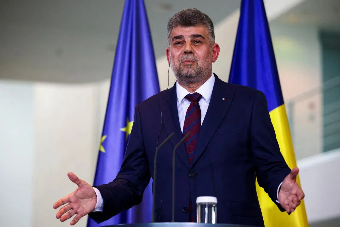 FILE PHOTO: Romanian Prime Minister Marcel Ciolacu attends a press conference with German Chancellor Olaf Scholz, at the Chancellery in Berlin, Germany July 4, 2023. REUTERS/Lisi Niesner/File Photo
