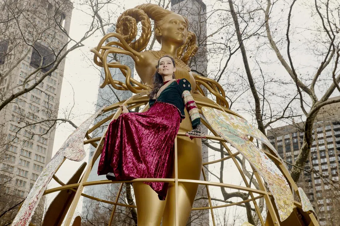 The 5.5m tall sculpture Witness includes hornlike braids, tentacle arms and a lace collar.