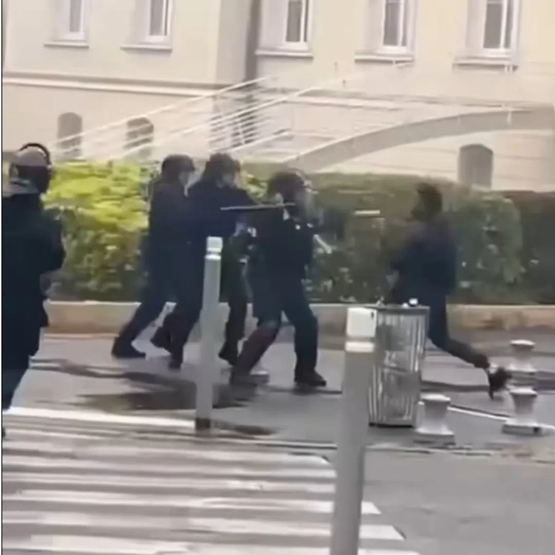 In videos of the incident shared on social media, a tear gas grenade is fired at the 14-year-old student’s face, knocking him to the ground.