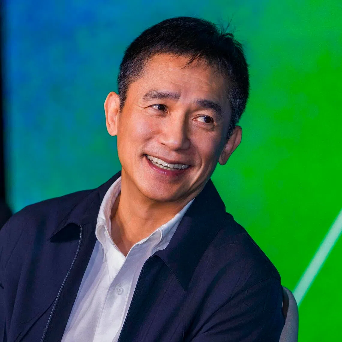 Actor Tony Leung Chiu Wai speaking at Marina Bay Sands Hibiscus Ballroom in a dialogue session on Nov 28 as part of the Singapore International Film Festival.
