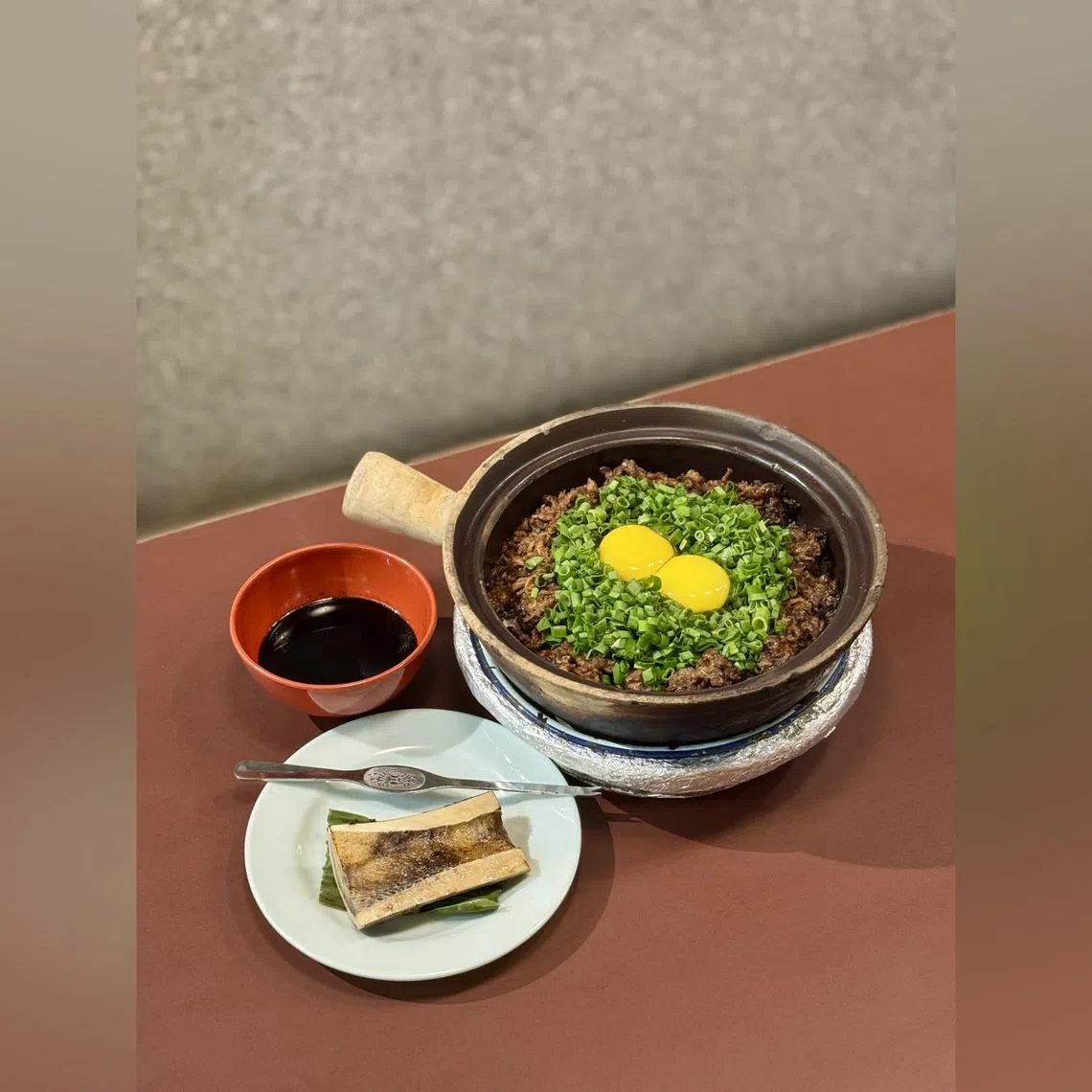Beef bone marrow claypot rice from Geylang Claypot Rice.