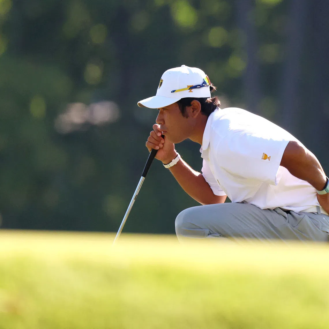Sep 26, 2026; Medinah, Illinois, USA;  Hideki Matsuyama of the International Team lines up a putt on the sixth green during the third round of the Presidents Cup.  Mandatory Credit: Jerod Ringwald-Imagn Images