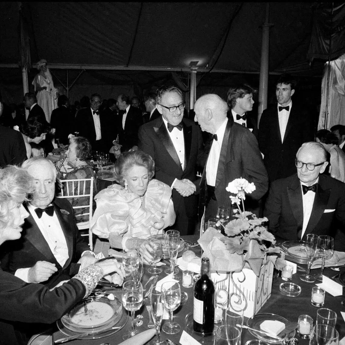 (From left) Nancy Kissinger, Walter H. Annenberg, Brooke Astor, Henry Kissinger, Isaac Bashevis Singer and Laurance S. Rockefeller at the opening of Gottesman Hall in New York on May 24, 1984.
