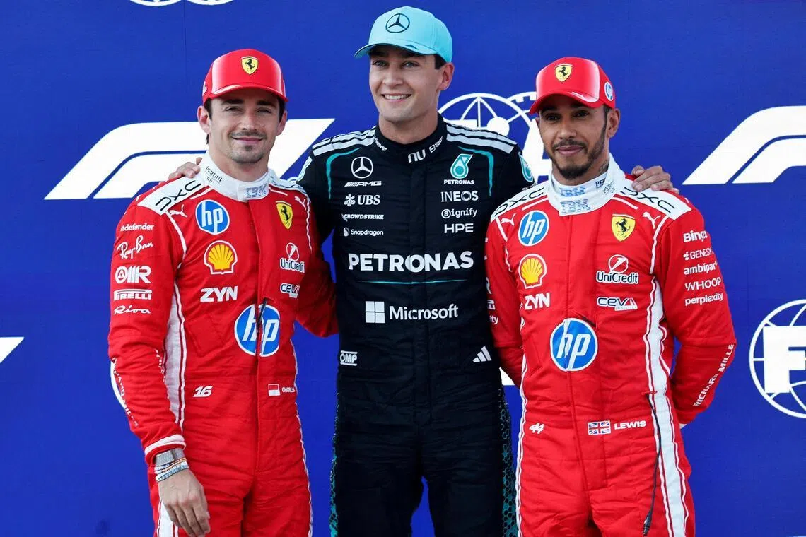 Formula One F1 - Austrian Grand Prix - Red Bull Ring, Spielberg, Austria - June 27, 2026
Mercedes' George Russell celebrates after qualifying in pole position with second place Ferrari's Charles Leclerc and third place Ferrari's Lewis Hamilton REUTERS/Lisa Leutner     TPX IMAGES OF THE DAY