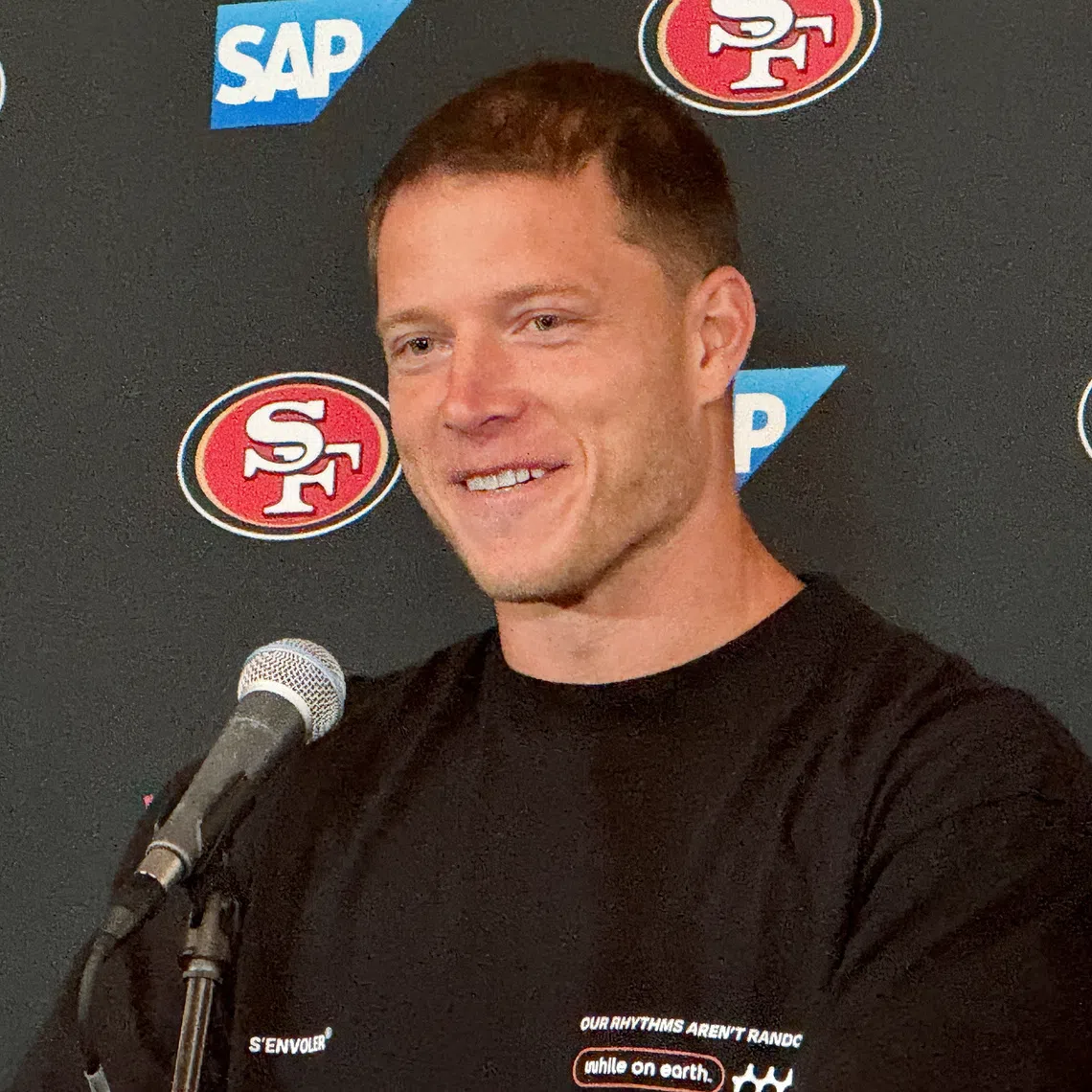 San Francisco 49ers running back Christian McCaffrey speaks at a press conference ahead of the first NFL game in Australia, at Melbourne Rectangular Stadium, in Melbourne, Australia, September 7,2026. Picture taken with a mobile phone. REUTERS/Ian Ransom