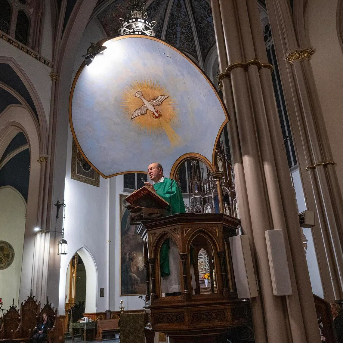 The Reverent Alex Santora delivering a homily about immigration at the Church of Our Lady of Grace and St Joseph in Hoboken, New Jersey, on Nov 16.