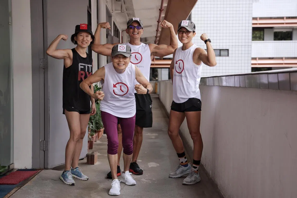 Mr Lim Tiat (rear centre), 52, his mother Charlotte Wong (front centre), 78, younger sister Lin Yan (right), 40, and Ms Melody Chong (left), 47-year-old PR consultant and health coach, at EINST Technology on Jan 31, 2024. They are aiming to win a seven-year international contest. Winners with a proven way to increase healthspan - reverse ageing - in people aged 65 and above will get US$101 million. For feature on the longevity industry in Singapore and the people trying to stay young and healthy until they die.