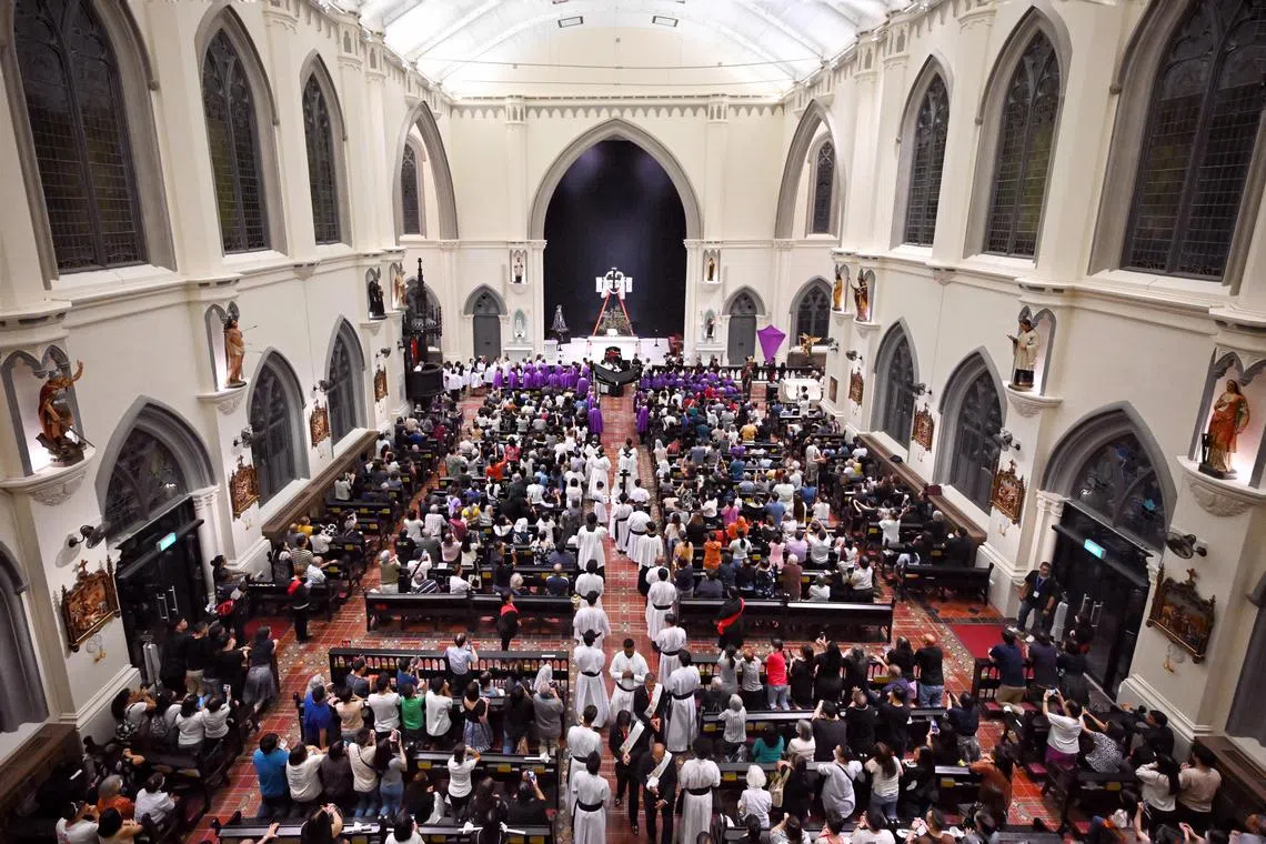 Worshippers during mass on Good Friday, the day Christians believe Jesus was crucified as a sacrifice to atone for mankind's sins, held at St. Joseph's Church at Victoria Street on March 29, 2024.