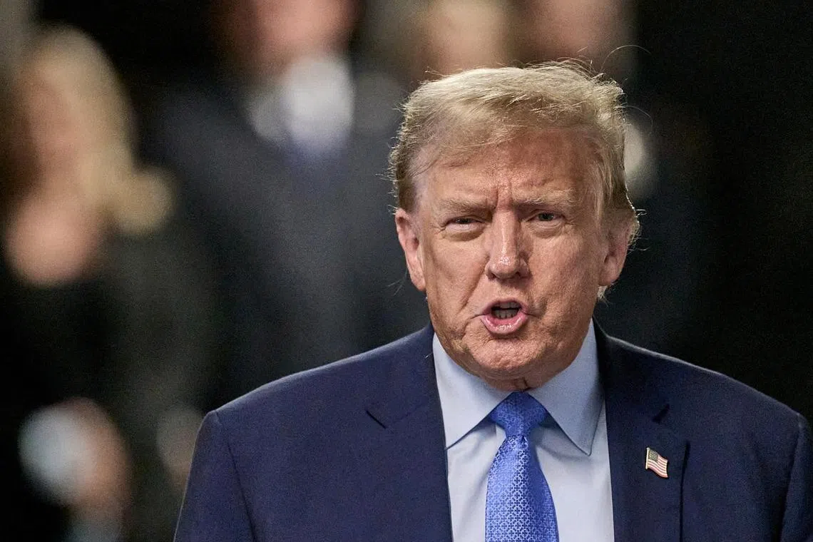 Former U.S. President Donald Trump speaks to members of the media at Manhattan criminal court in New York, U.S., on Friday, April 26, 2024. Trump faces 34 felony counts of falsifying business records as part of an alleged scheme to silence claims of extramarital sexual encounters during his 2016 presidential campaign. CURTIS MEANS/Pool via REUTERS