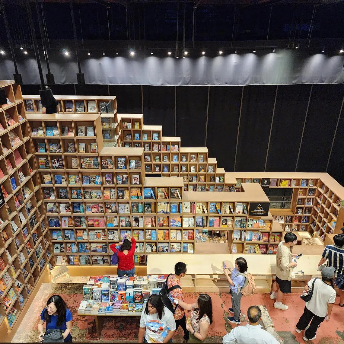 hzbooks - The BookXcess store at RexKL sees hordes of visitors flocking to take selfies here for its unconventional aesthetics.
ST PHOTO: HAZLIN HASSAN
