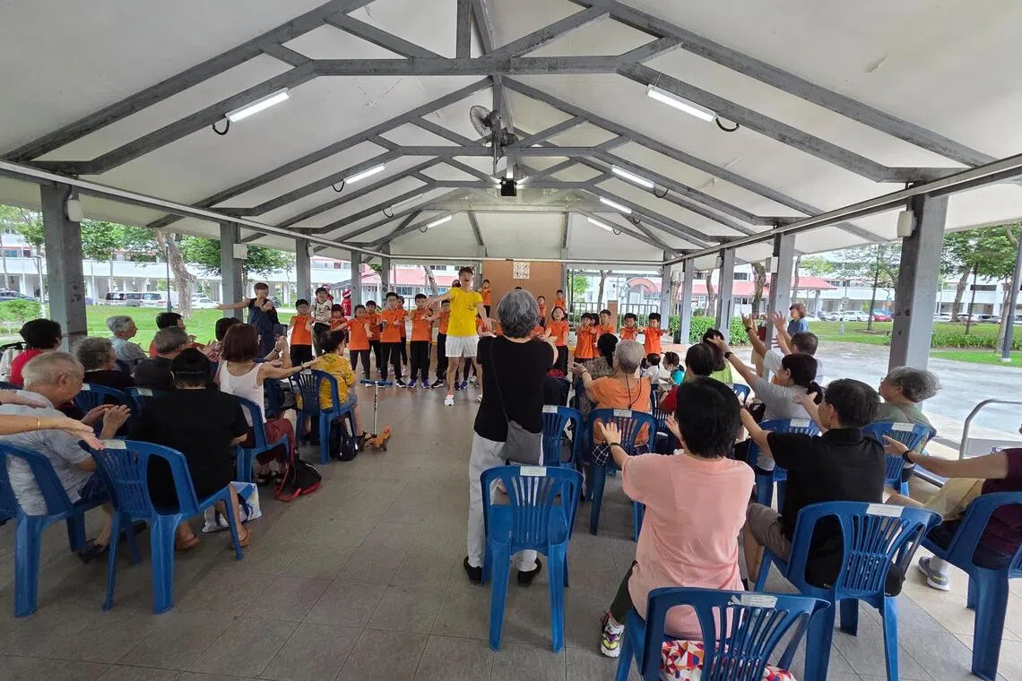 Beyond conversational Hokkien lessons, Jeremiah Soh of Singapore Hokkien Huay Kuan Cultural Academy incorporates intergenerational activities through music and movement.