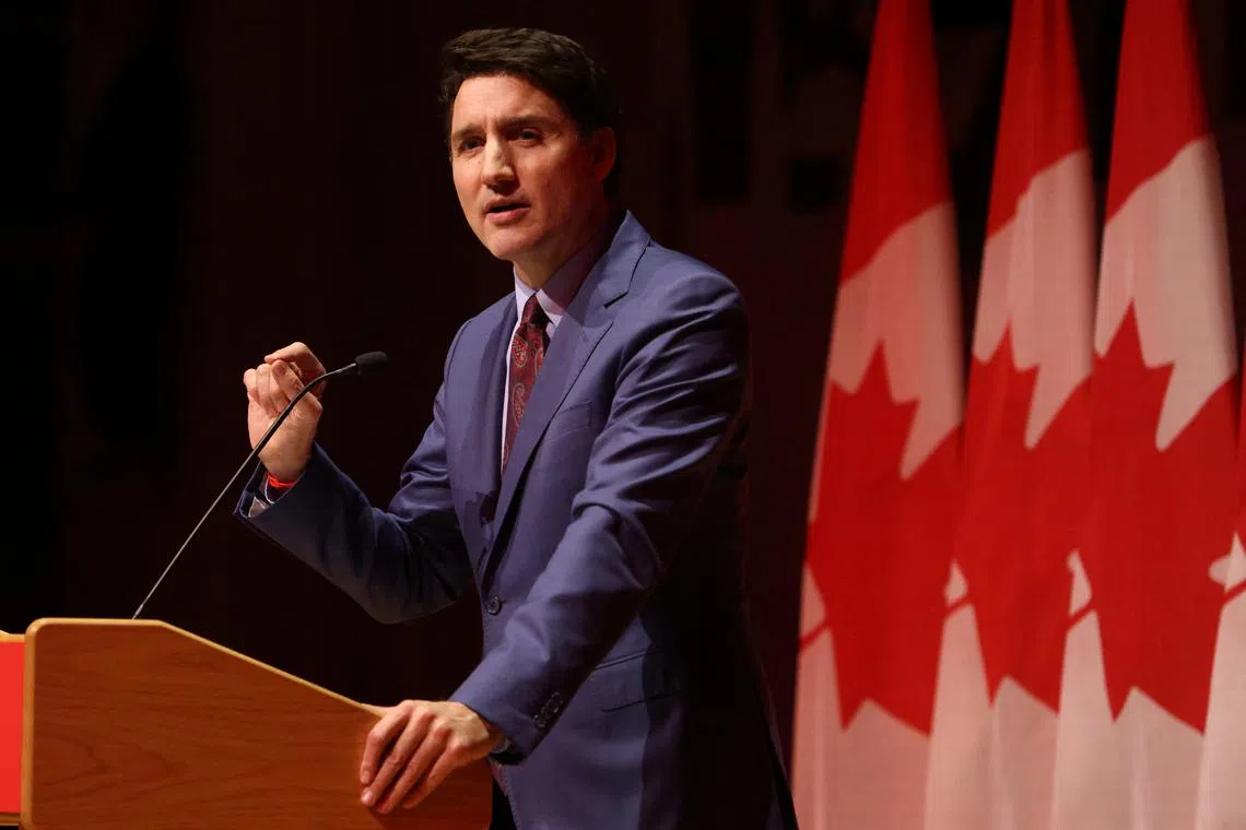 FILE PHOTO: Canada's Prime Minister Justin Trudeau speaks at the Laurier Club holiday party in Gatineau, Quebec, Canada, December 16, 2024.  REUTERS/Patrick Doyle/File Photo