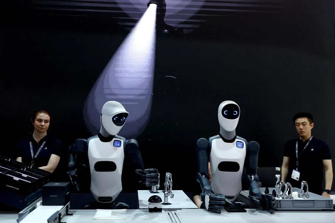 Staff of Agile Robots working at the exhibition stand at the Hannover Messe, one of the world's largest industrial trade fairs, in Hanover, Germany, on April 20, 2026.