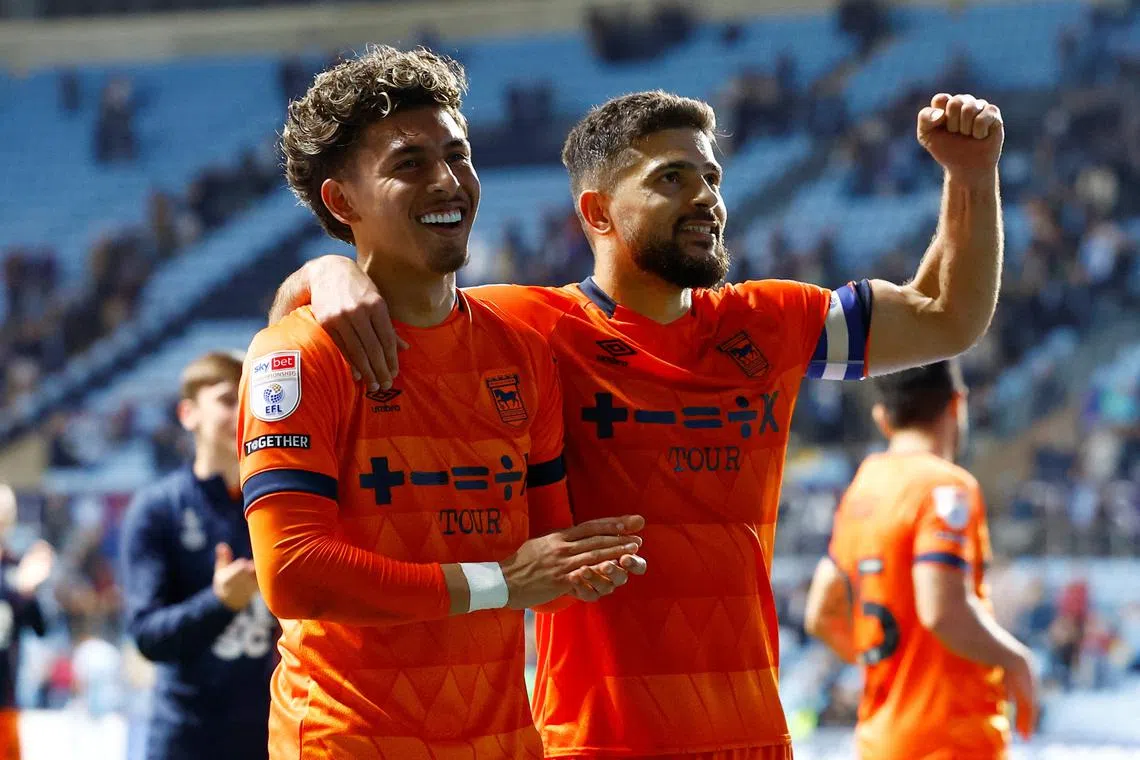 Soccer Football - Championship - Coventry City v Ipswich Town - Coventry Building Society Arena, Coventry, Britain - April 30, 2024 Ipswich Town's Jeremy Sarmiento and Sam Morsy celebrate after the match Action Images/Peter Cziborra
