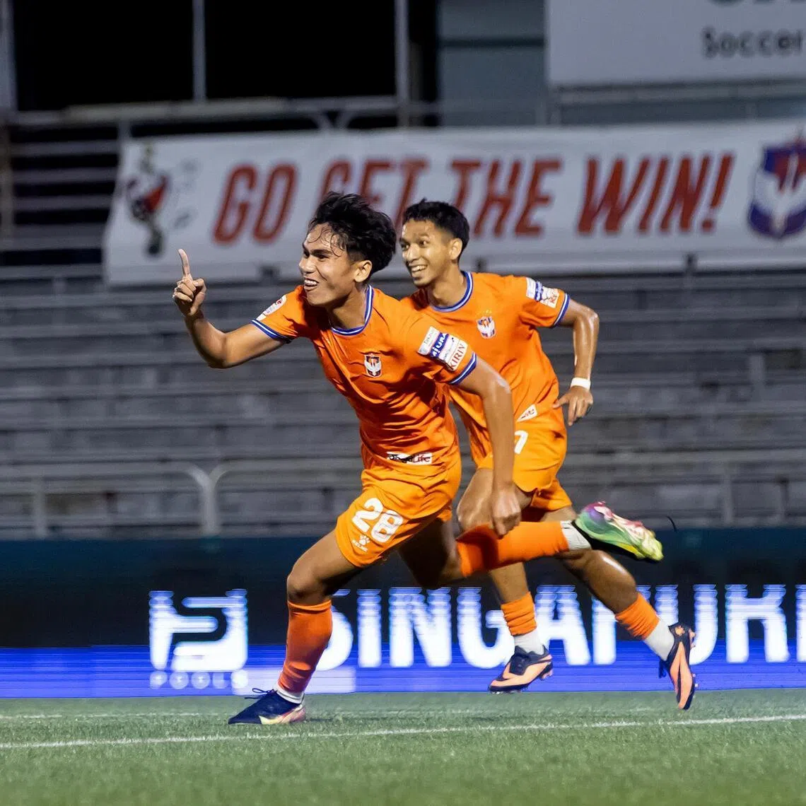 Albirex Niigata’s Liska Iskandar (left, with Danish Qayyum) celebrates after scoring the second goal in their 2-0 Singapore Premier League win over Geylang International on Feb 2.