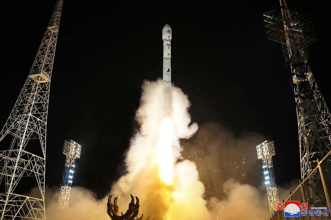 A rocket carrying North Korea's reconnaissance satellite being launched on Nov 21. 
