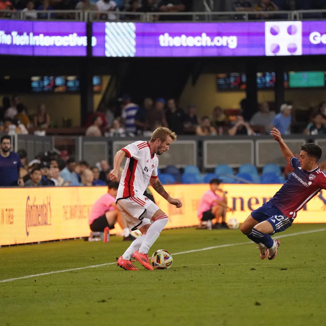 Oct 2, 2024; San Jose, California, USA; San Jose Earthquakes midfielder Jackson Yueill (14) dribbles against FC Dallas forward Alan Velasco (20) in the first half at PayPal Park. David Gonzales-Imagn Images/File Photo