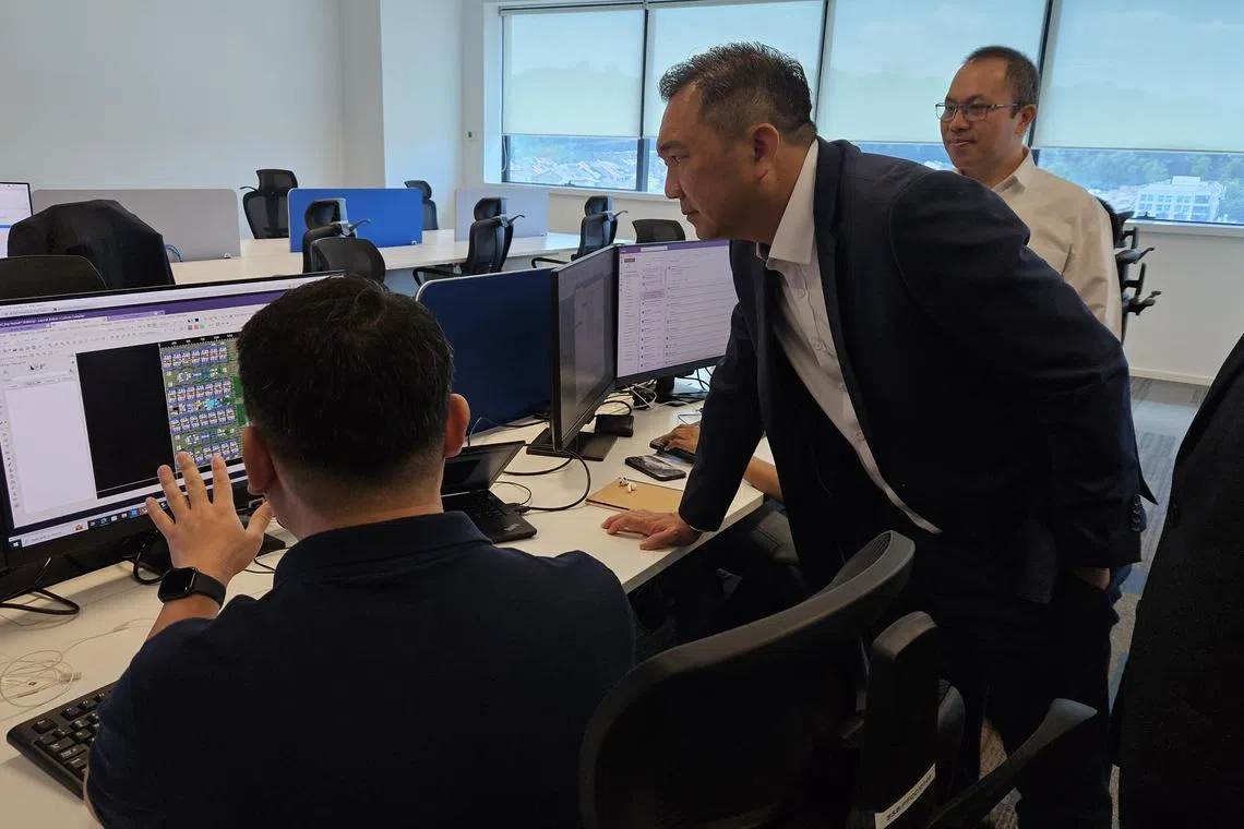 whsemicon - Selangor State Executive Councillor for Investment Ng Sze Han is inspecting an IC design park in Puchong, Malaysia launched in Aug 2024. ST PHOTO LU WEI HOONG