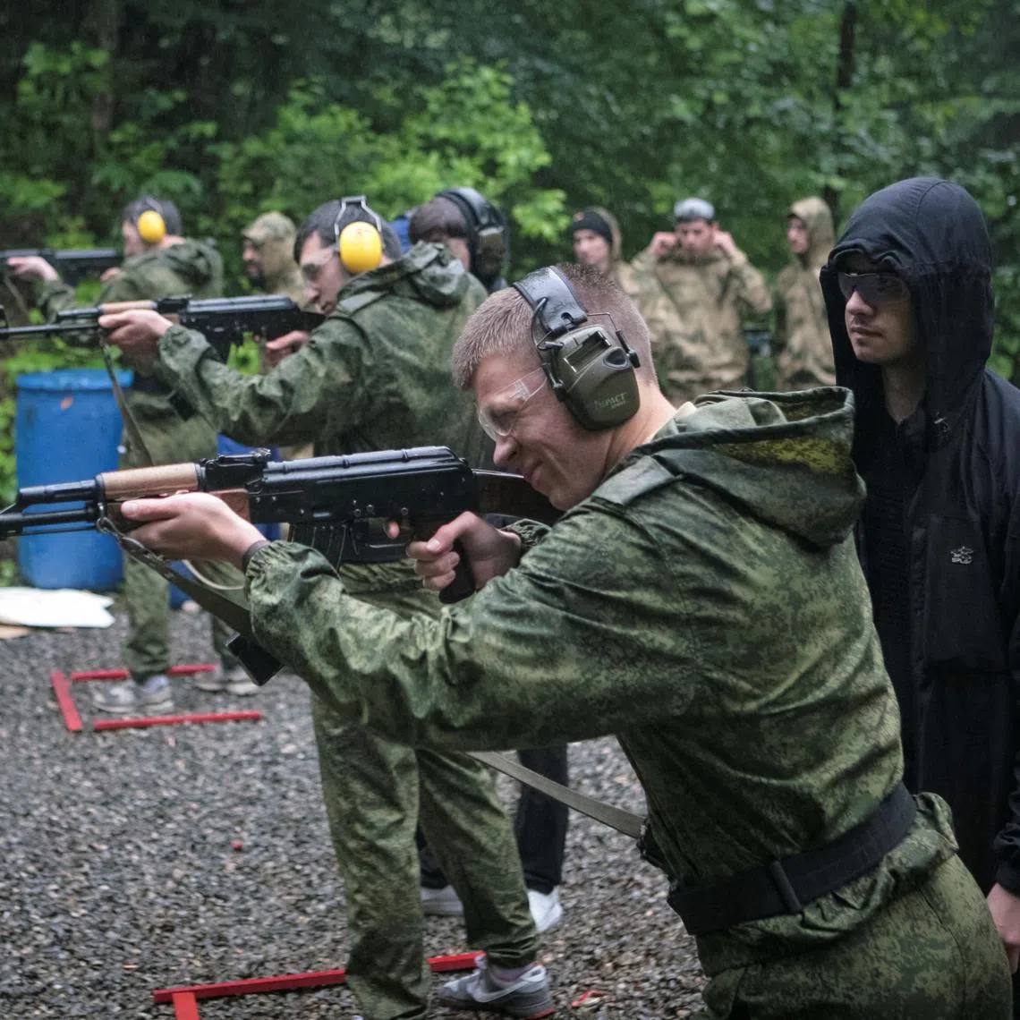 Pupils fire automatic rifles at a range in Vladikavkaz, Russia May 10, 2024. REUTERS/Kazbek Basayev/ File Photo