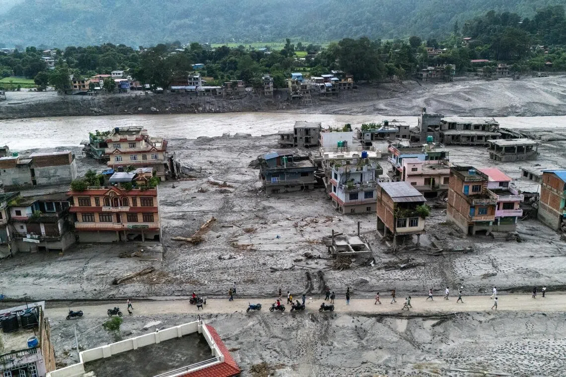Nepal resumes flood rescue, seeks technical help and billions of dollars