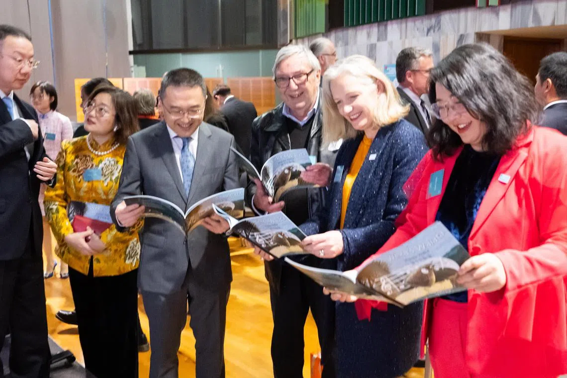 Ms Jo Coughlan (second from right) reading the trilingual children’s book Weka’s Waiata with guests at the launch of New Zealand Chinese Language Week, at the Beehive’s banquet hall, on Sept 18.